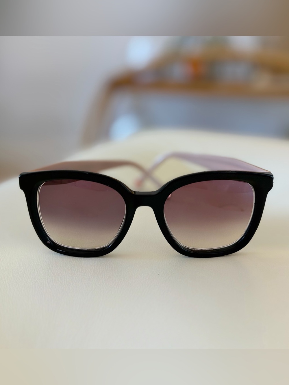 Carolina Herrera designer sunglasses.